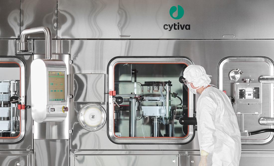 Close up of SA25 Aseptic Filling Workcell with operator