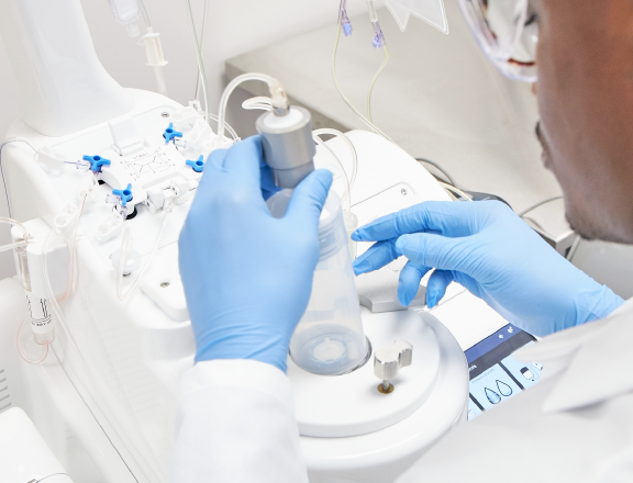 Scientist using Sepax C-Pro cell processing system