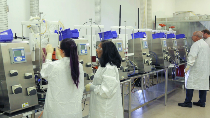 scientists using single-use equipment