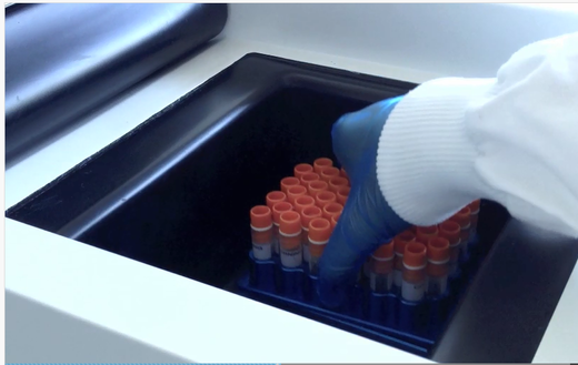 Person putting cell vials in VIA Freeze controlled-rate freezer