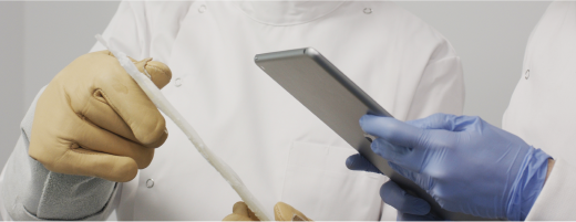 Scientists looking at iPads