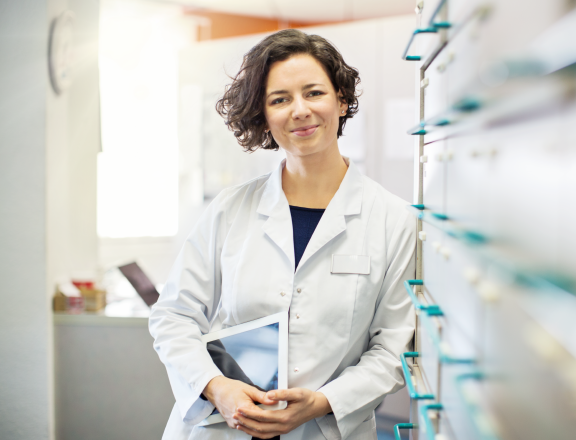 Scientist in data filing area